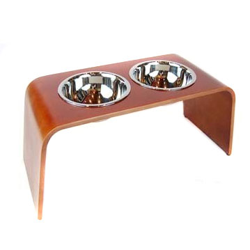 http://www.callingalldogs.com/images/products/detail/woodwaterfallraiseddogbowlstand.jpg